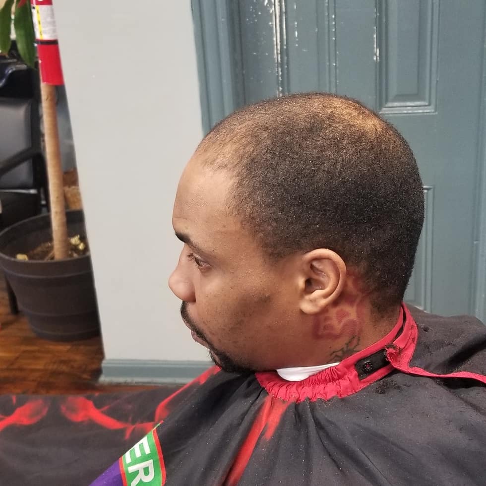 Before: close-cropped haircut